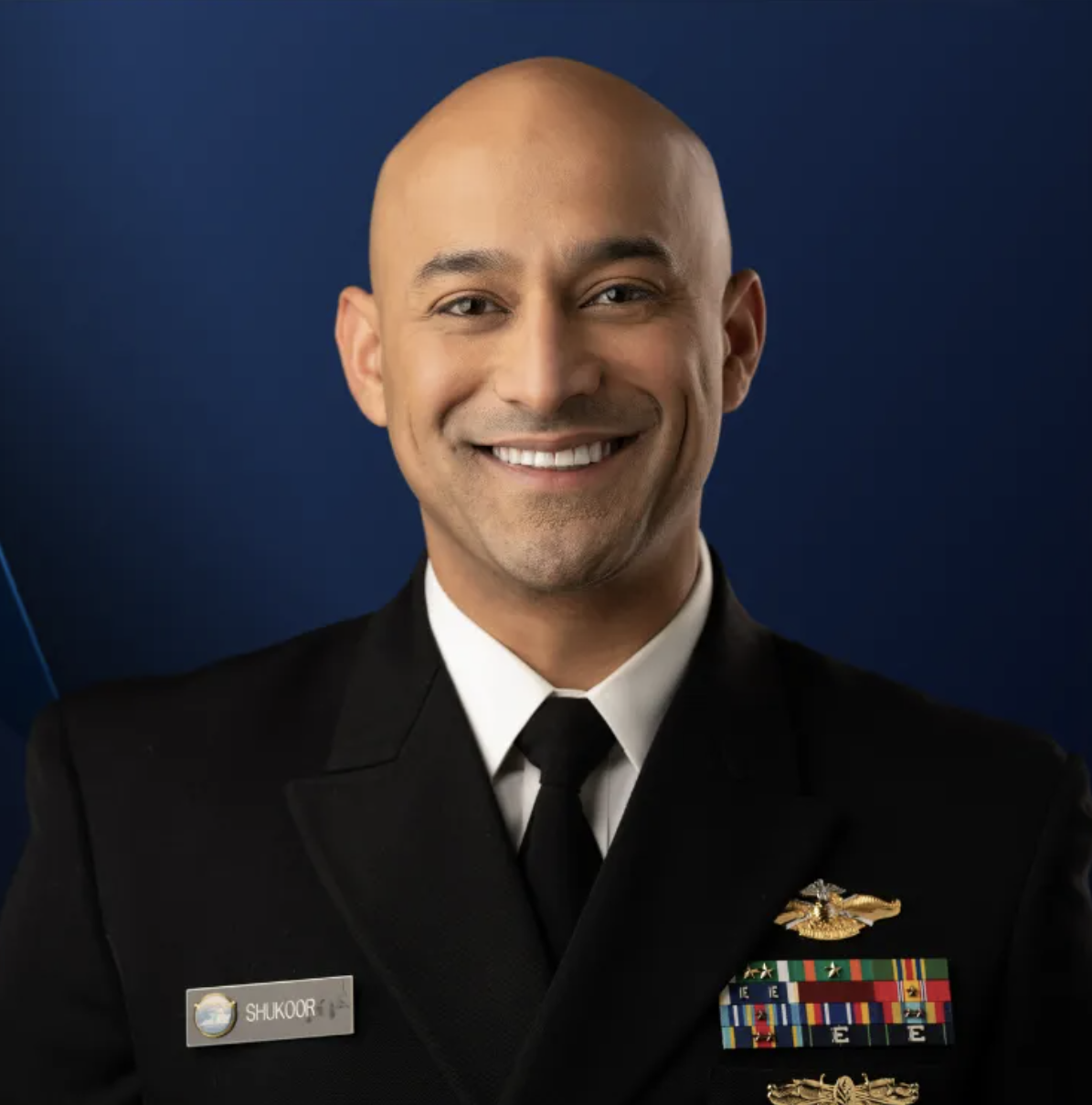 Dr. Kambez Shukoor in U.S. Navy uniform — a portrait of the dentist during his military service