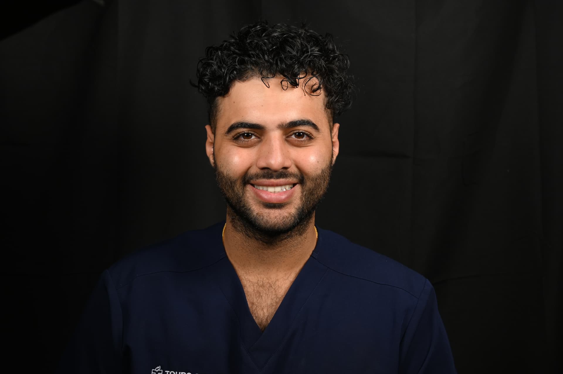 Professional headshot of Vish
