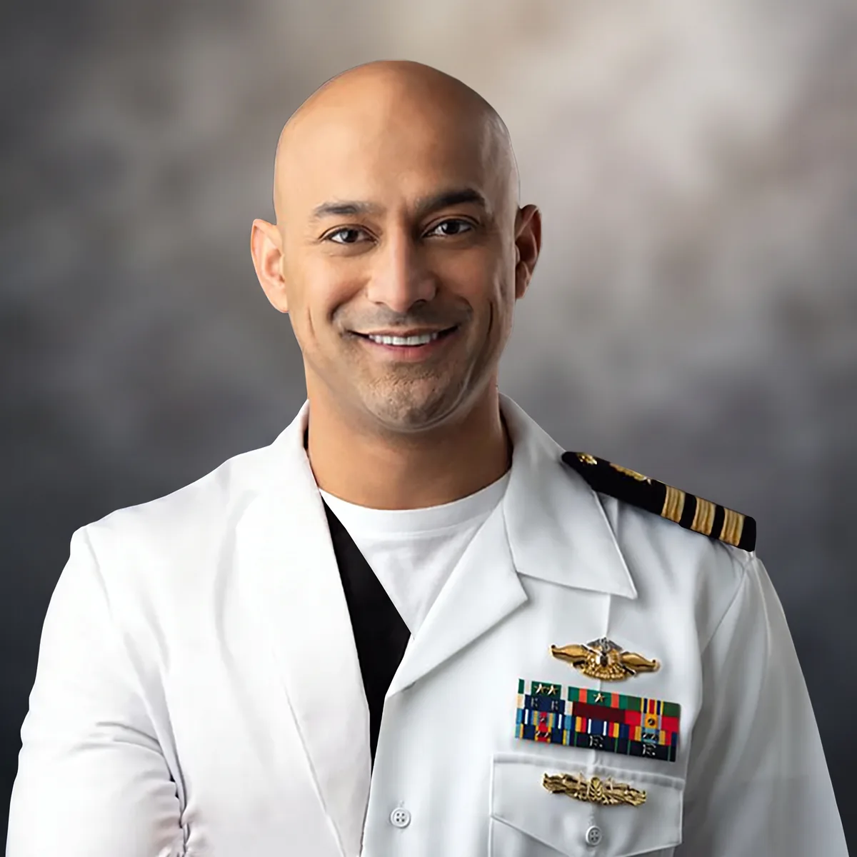 Dr. Kambez Shukoor, implant and cosmetic dentist, at DC Implant & Cosmetic Dentistry in Washington, DC